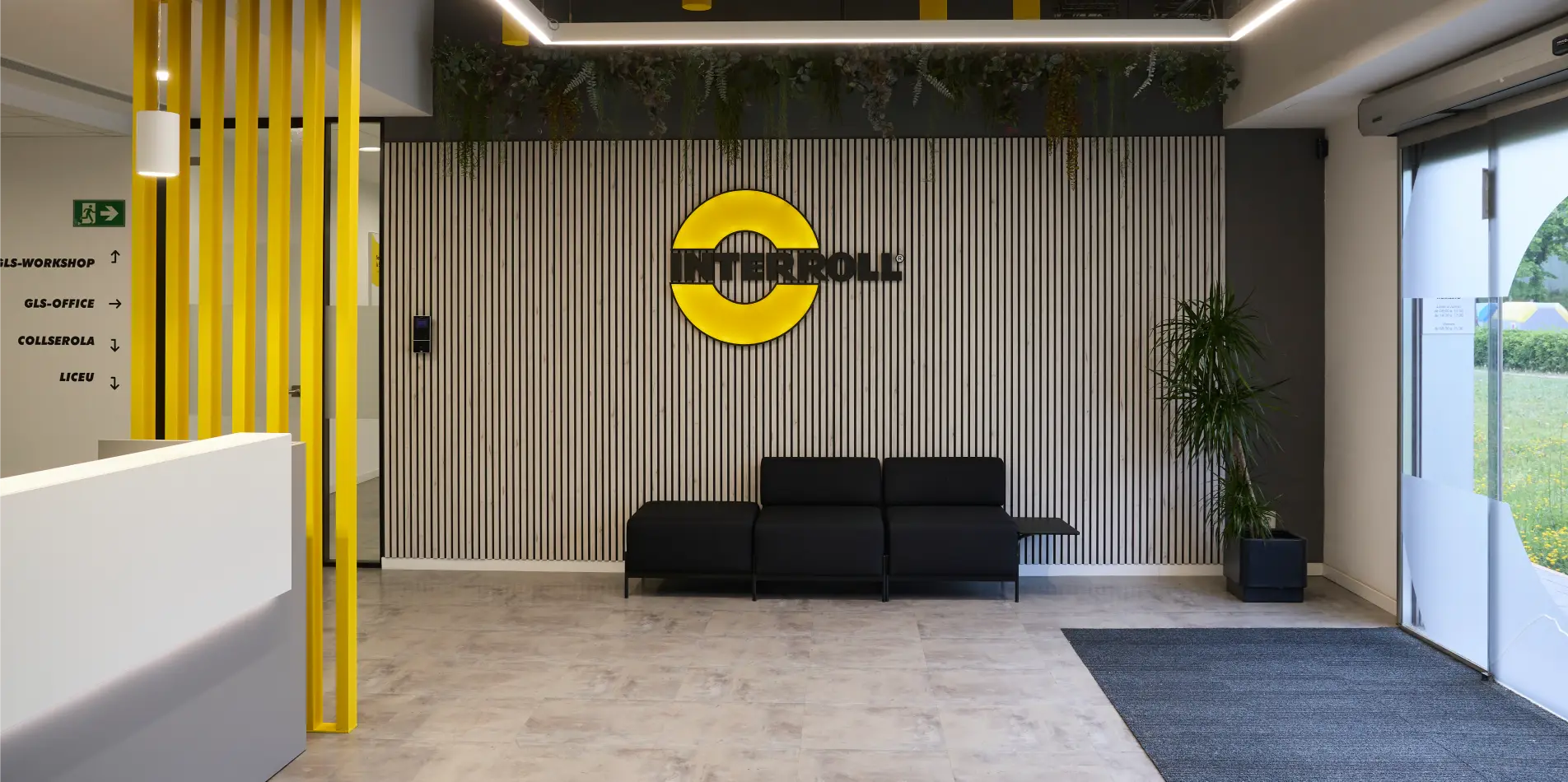 Reforma oficinas Interroll by Wholecontract